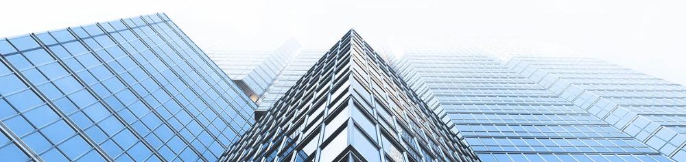 Imagen abstracta representativa del título en la que aparece un edificio moderno